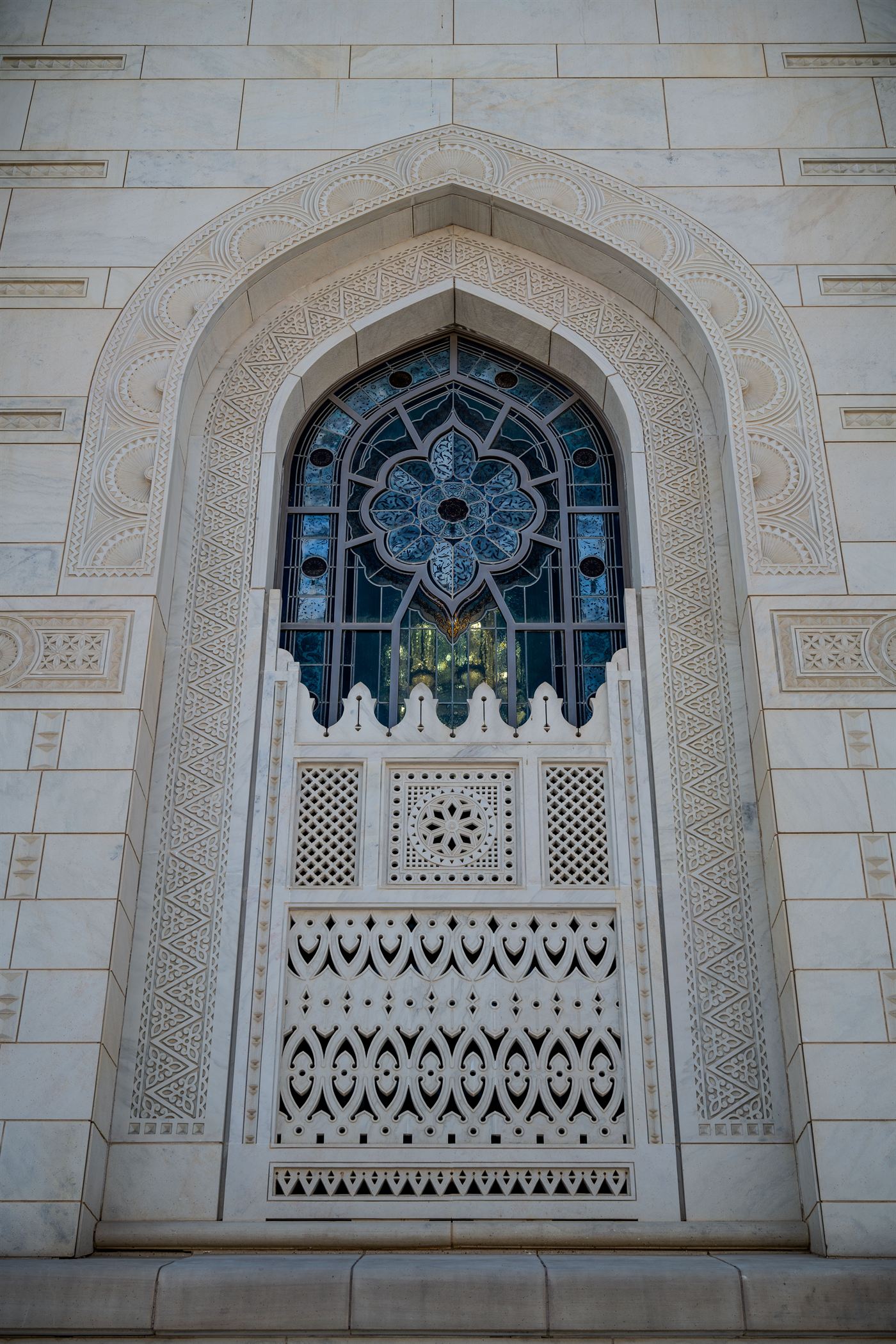 Carved marble window with stained glass, Muscat